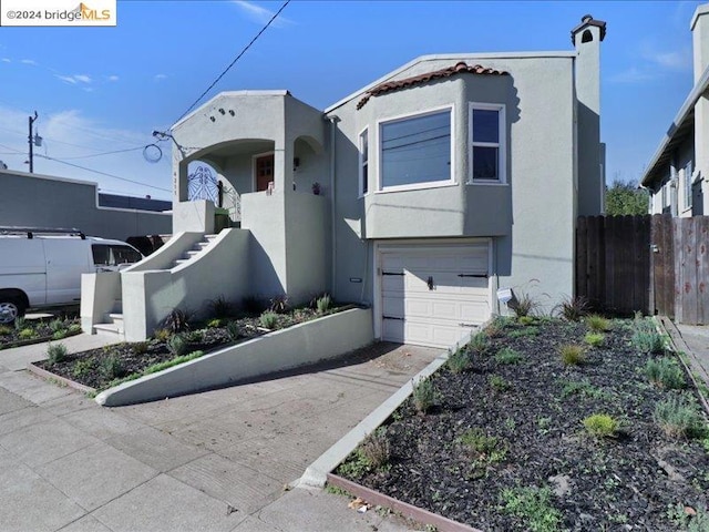 view of front of property with a garage