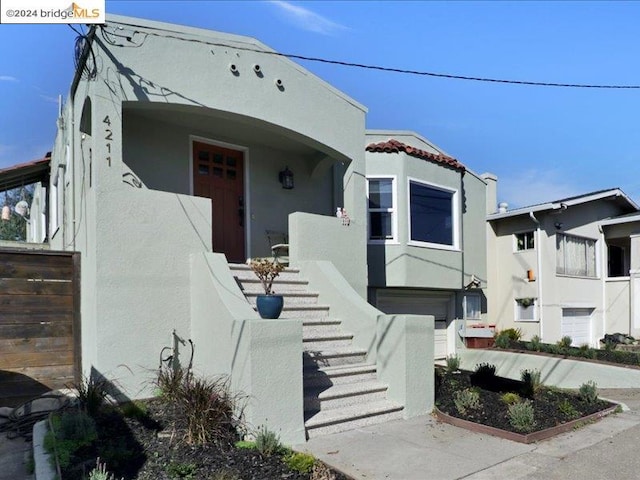 view of front of property with a garage