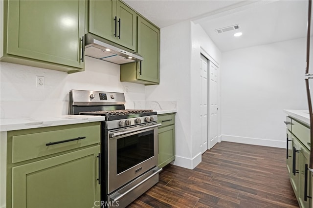 kitchen featuring gas range, light stone countertops, green cabinetry, and dark hardwood / wood-style floors