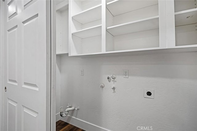 325 W Bush St, Lemoore, CA 93245 - laundry area featuring gas dryer hookup, hookup for an electric dryer, dark wood finished floors, and baseboards