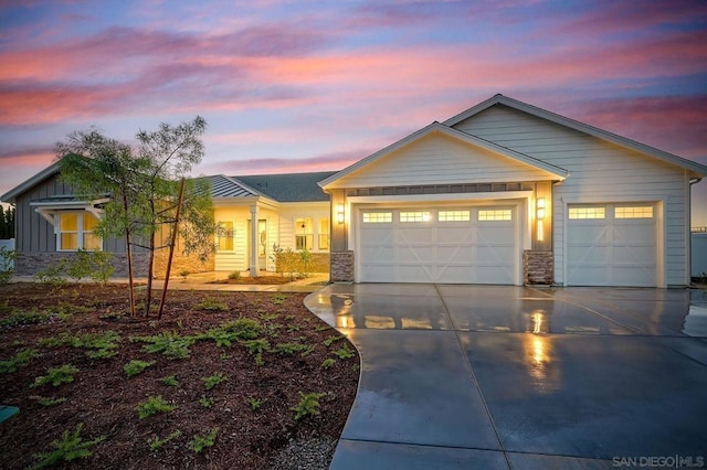 view of front of property featuring a garage