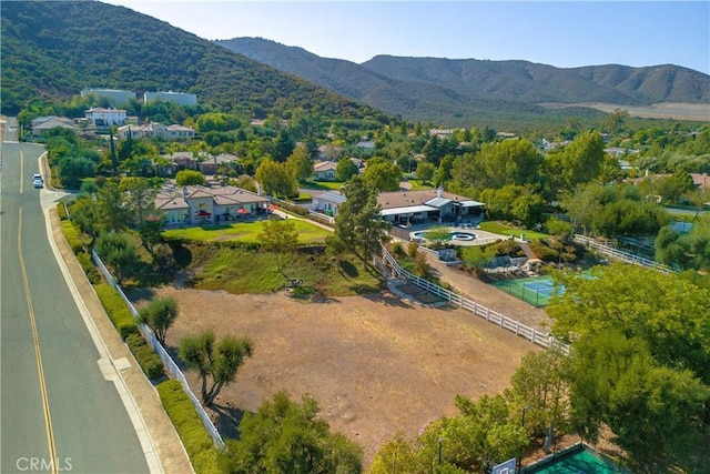 drone / aerial view featuring a mountain view