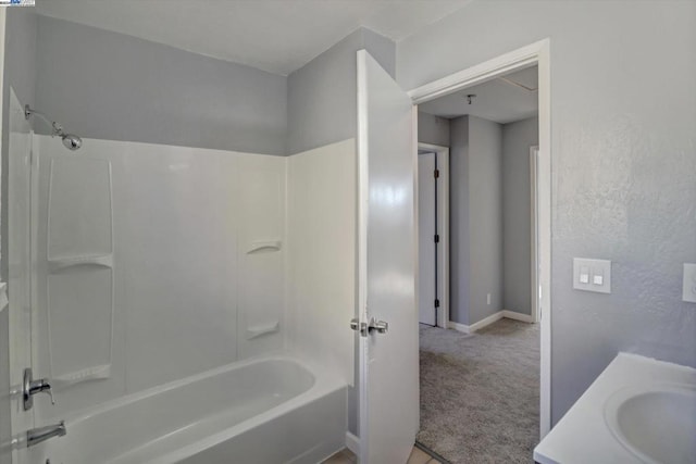 bathroom featuring vanity and bathing tub / shower combination