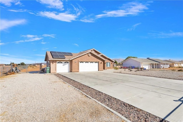 view of front of home with solar panels