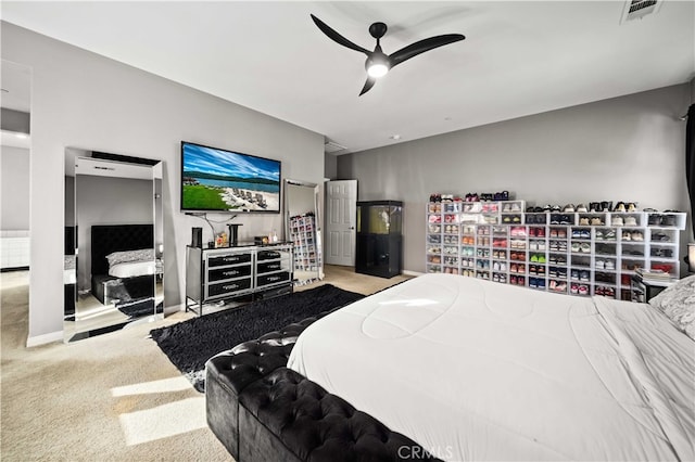 carpeted bedroom with ceiling fan