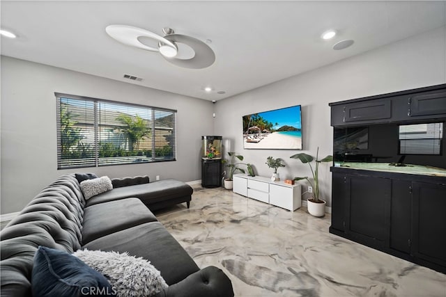 living room featuring ceiling fan