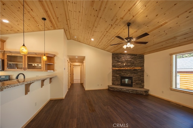 unfurnished living room with wood ceiling, a fireplace, lofted ceiling, and dark hardwood / wood-style floors