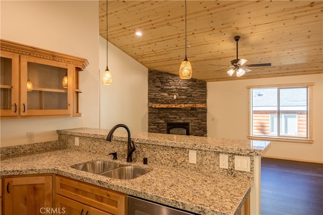 kitchen with lofted ceiling, dark hardwood / wood-style flooring, light stone countertops, wooden ceiling, and sink