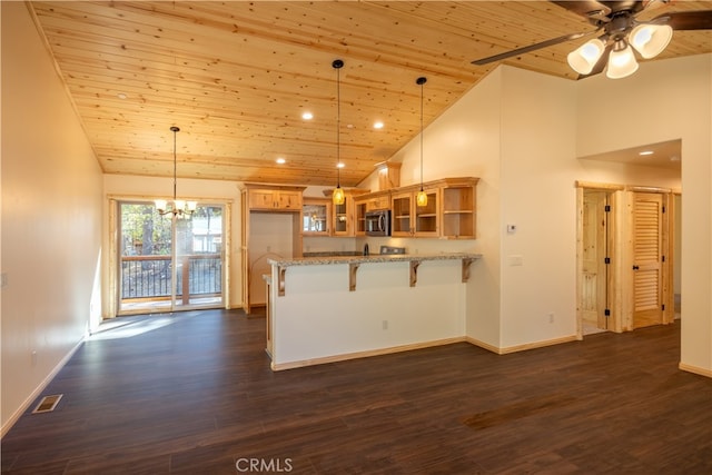 kitchen with kitchen peninsula, wooden ceiling, a breakfast bar, pendant lighting, and dark hardwood / wood-style flooring