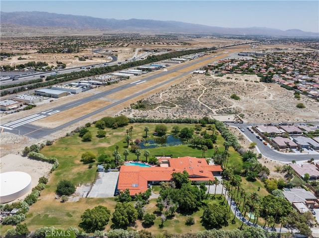 drone / aerial view featuring a mountain view