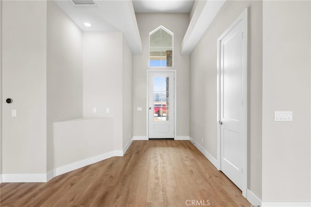 26176 Boulder View Ct, Menifee, CA 92584 - foyer entrance featuring light wood-style flooring and baseboards