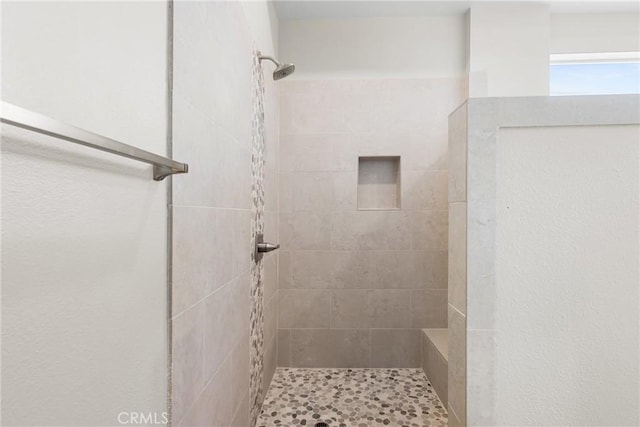 26176 Boulder View Ct, Menifee, CA 92584 - bathroom featuring a tile shower
