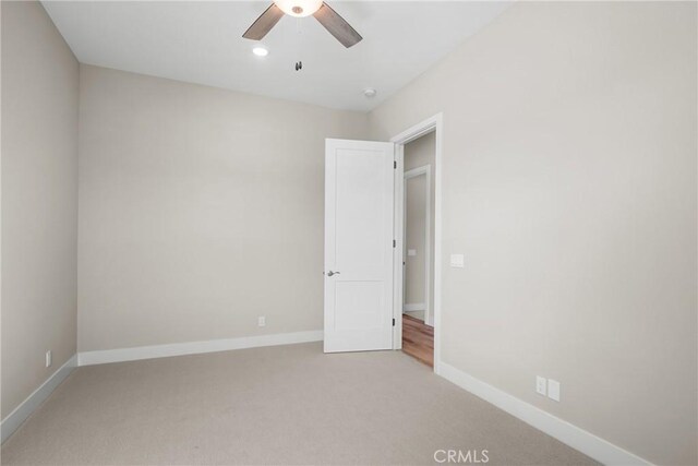 26176 Boulder View Ct, Menifee, CA 92584 - unfurnished bedroom featuring light colored carpet and ceiling fan