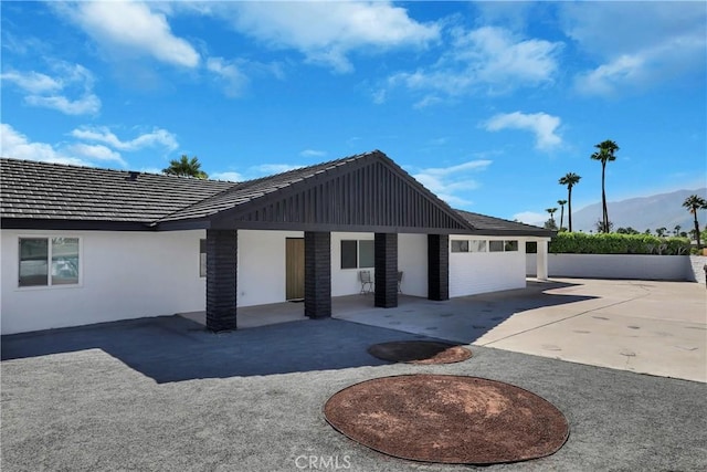 exterior space featuring a mountain view