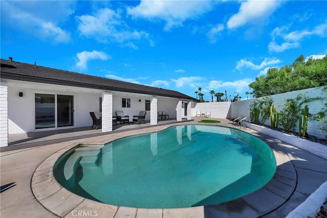 view of pool with a patio