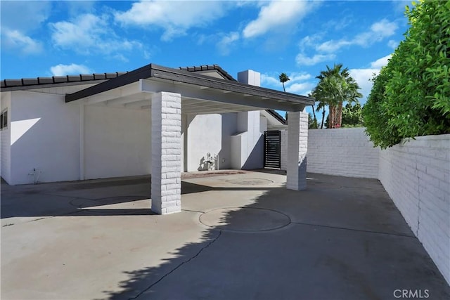 view of patio with a carport