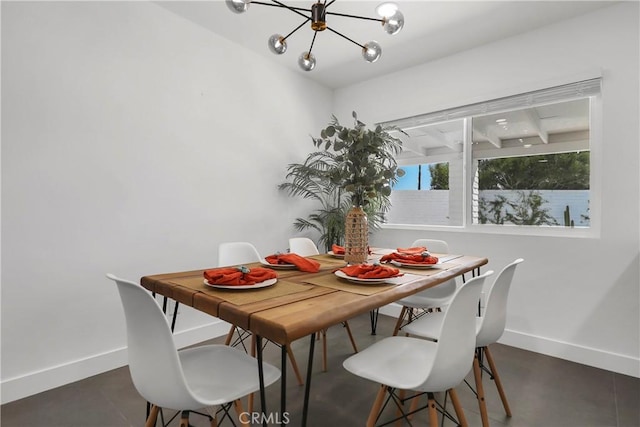 dining space with beam ceiling and an inviting chandelier