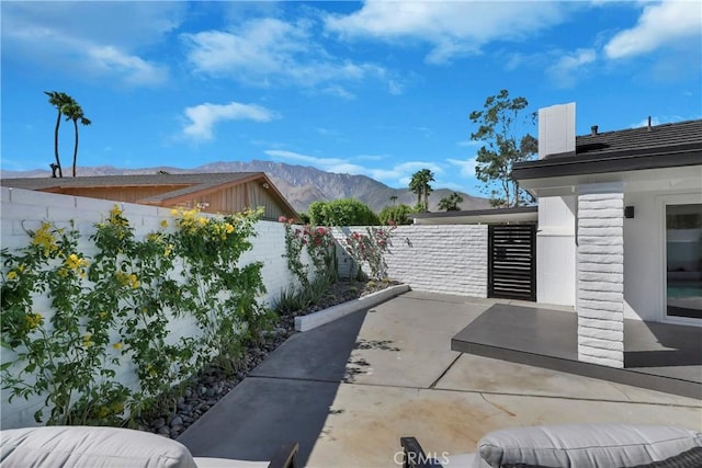 view of patio featuring a mountain view