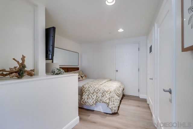 bedroom featuring light wood-type flooring