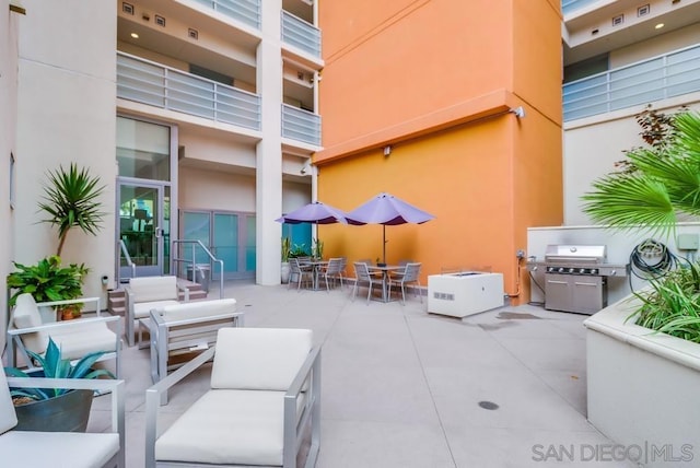 view of patio with a grill