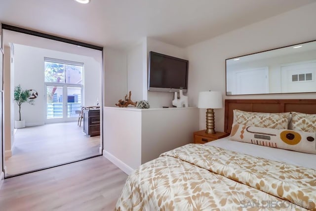 bedroom featuring light hardwood / wood-style floors