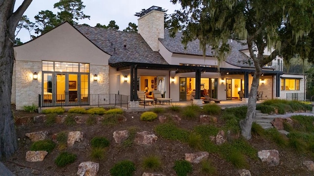 rear view of house with a patio area