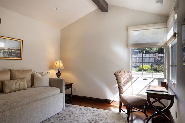 interior space with dark wood-type flooring and vaulted ceiling with beams