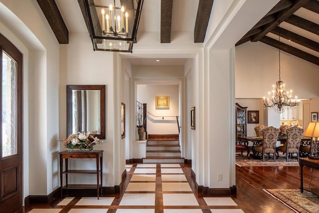 interior space featuring hardwood / wood-style floors, a notable chandelier, and beamed ceiling