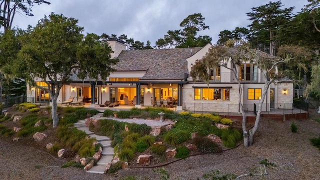 rear view of property with a patio area