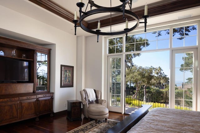 bedroom with dark wood-type flooring, a chandelier, access to outside, and multiple windows