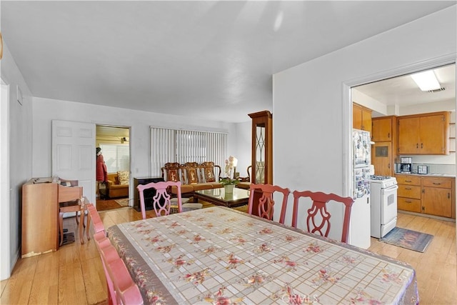 dining room featuring light hardwood / wood-style floors