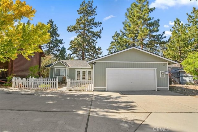 single story home featuring a garage