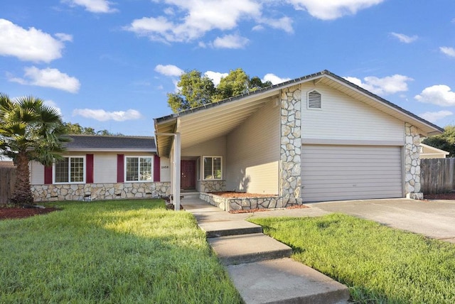 single story home with a carport, a garage, and a front yard