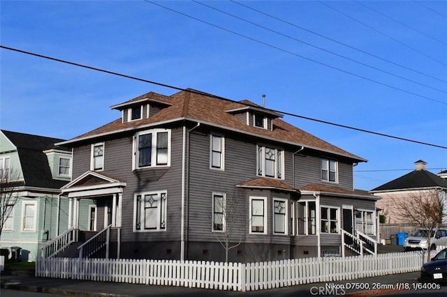 view of front facade featuring a sunroom