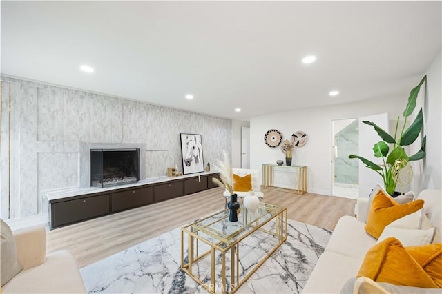 living room with light hardwood / wood-style flooring