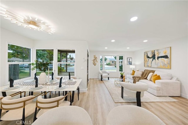 living room with light hardwood / wood-style flooring