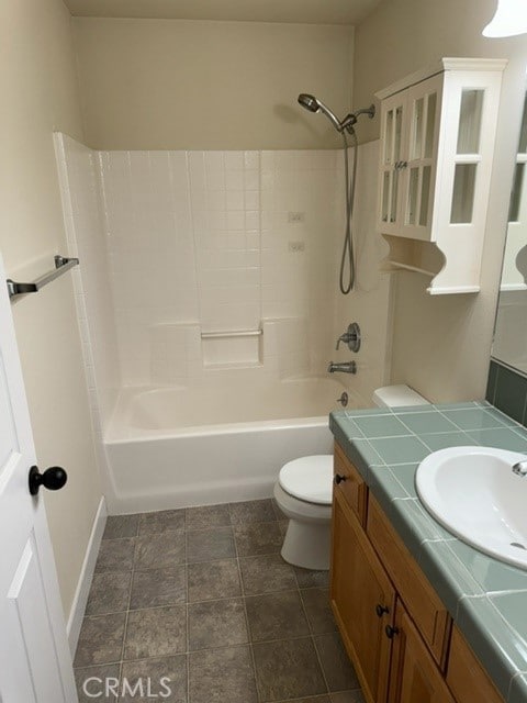 full bathroom with vanity, shower / bath combination, and toilet