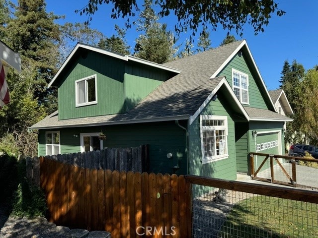 view of property exterior featuring a garage