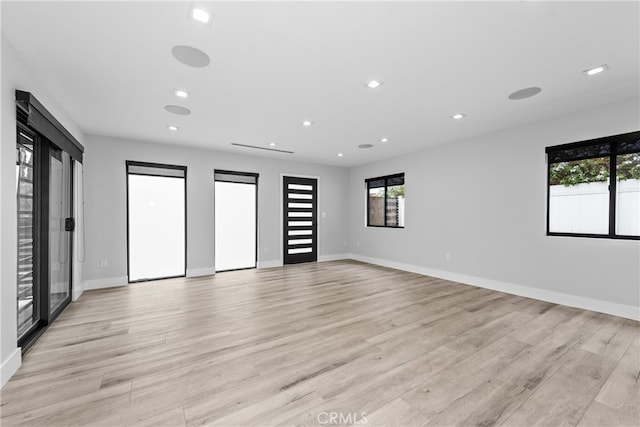 unfurnished bedroom featuring light hardwood / wood-style flooring