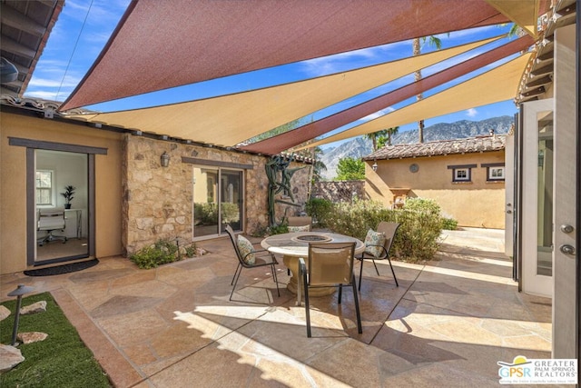 view of patio featuring a mountain view