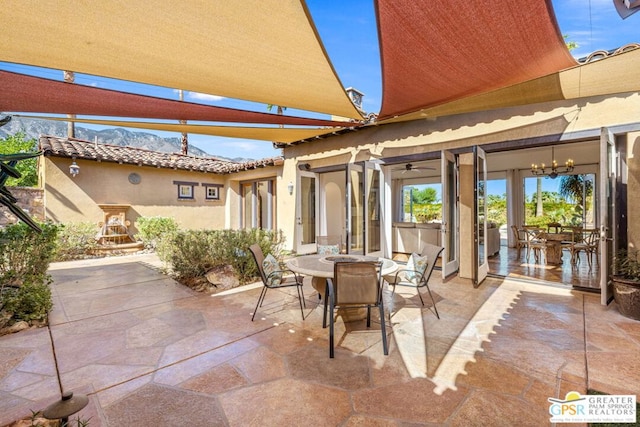 view of patio with ceiling fan