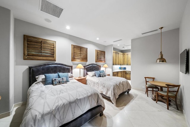 bedroom with light tile patterned floors