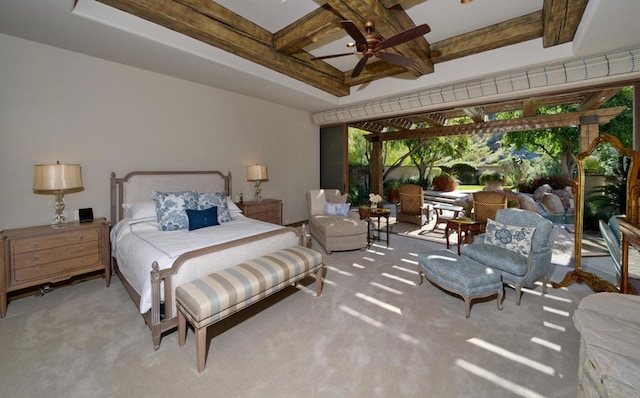 bedroom featuring beamed ceiling, light colored carpet, and ceiling fan