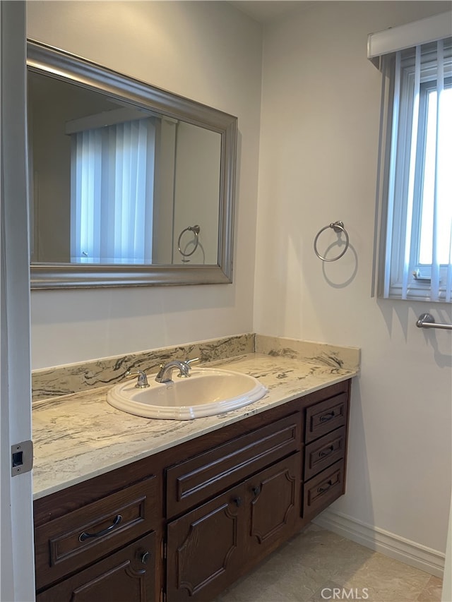 bathroom featuring vanity and tile patterned flooring