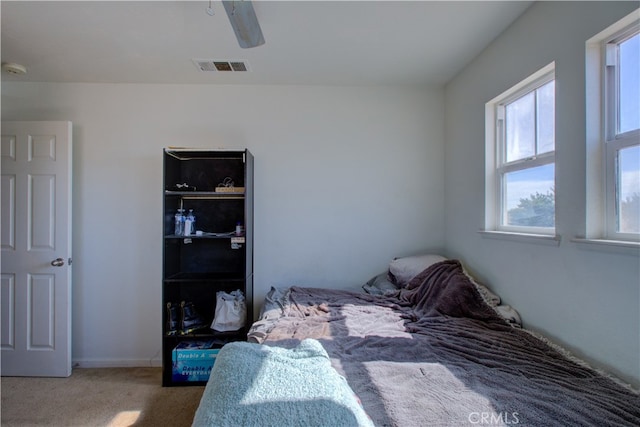 bedroom with carpet and ceiling fan