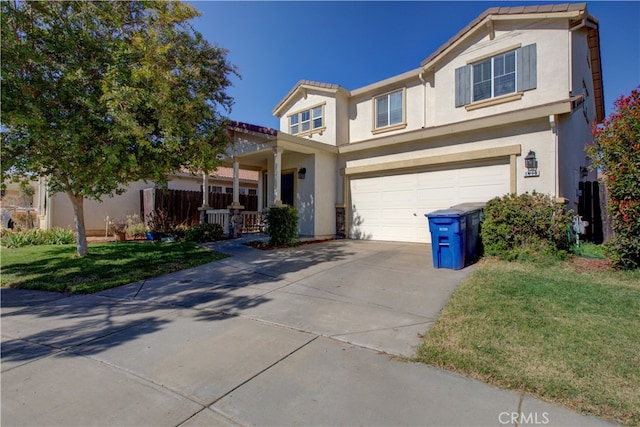 view of front facade featuring a front yard and a garage