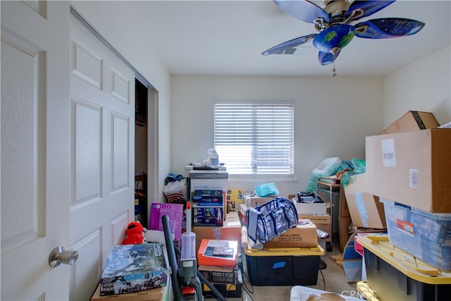 storage room with ceiling fan