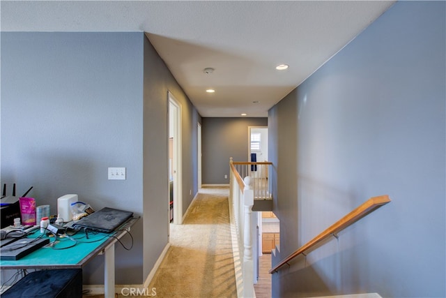 hallway with light carpet