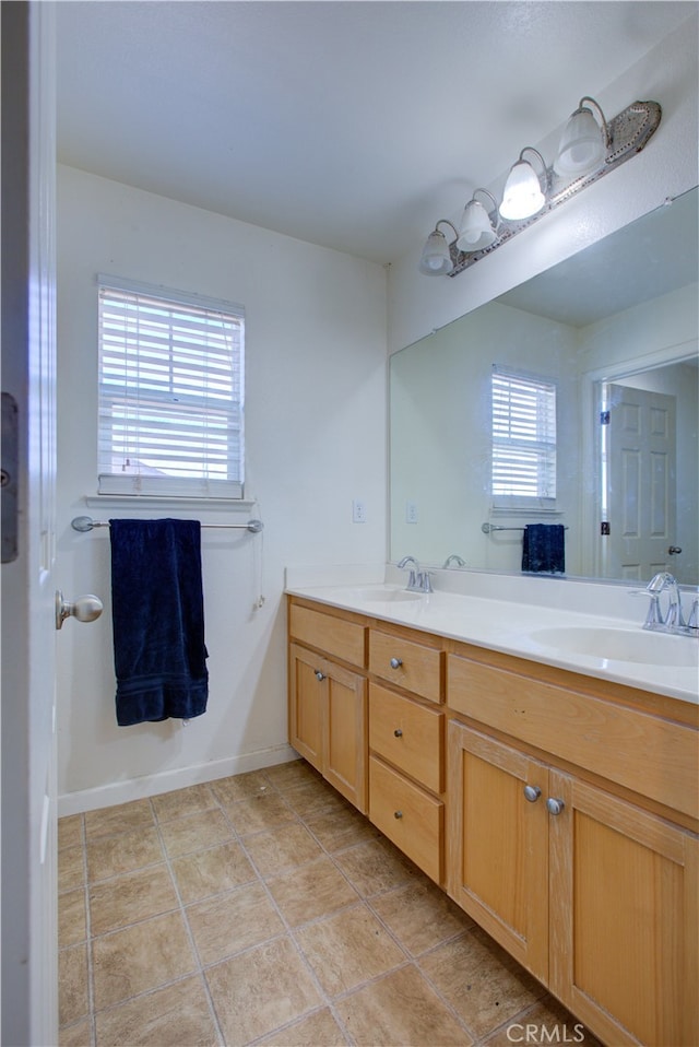 bathroom featuring vanity and tile patterned floors