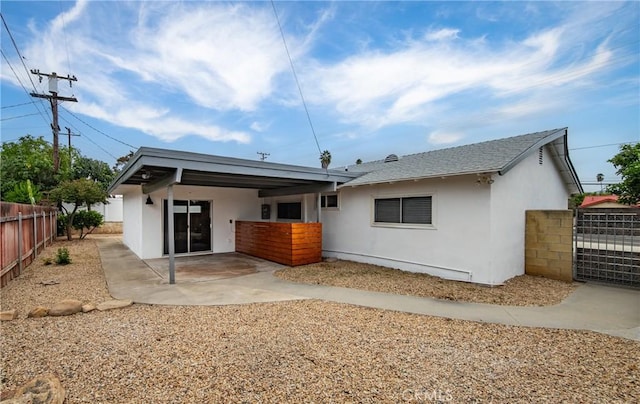 back of house featuring a patio